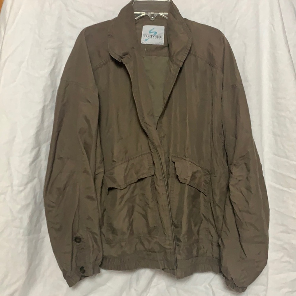 Green lightweight windbreaker jacket